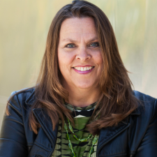 headshot of Katherine Rowlands, FAC Board President and publisher of Bay City News