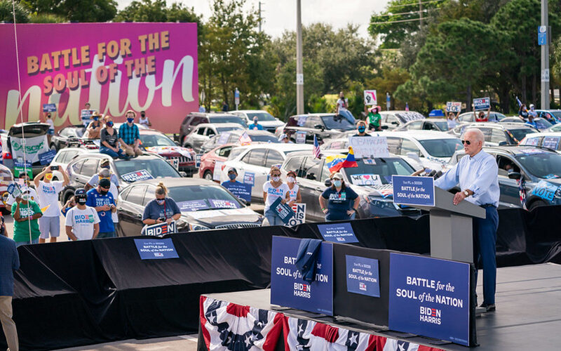 Photograph of President Joe Biden speaking at a car rally in 2022.