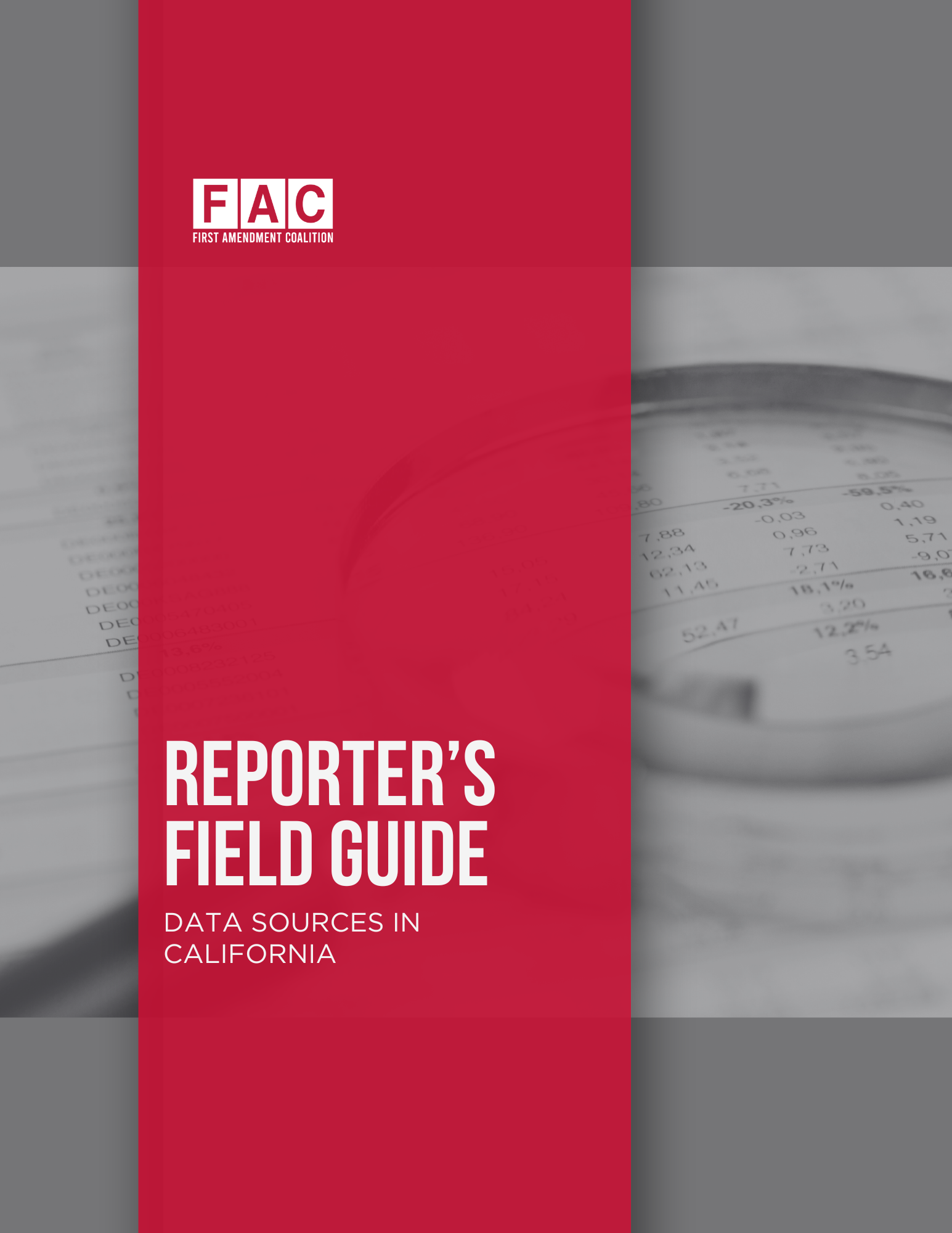 black and white photo of a spreadsheet with a magnifying glass placed on top of it.